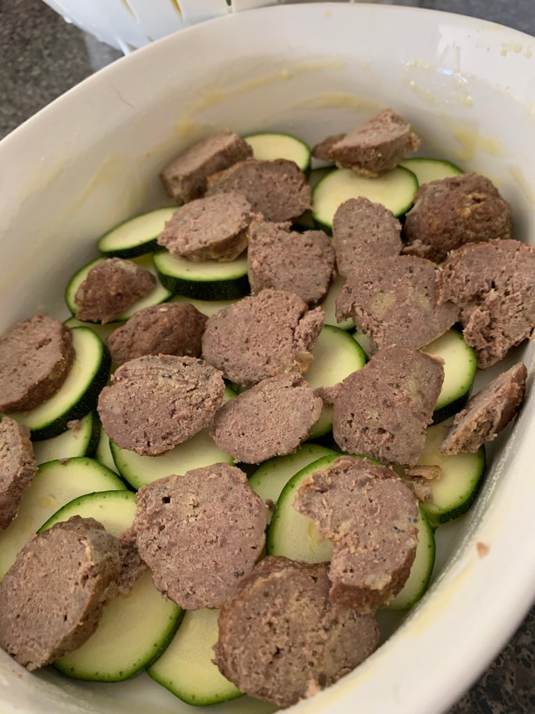 Layering the meatballs and zucchini