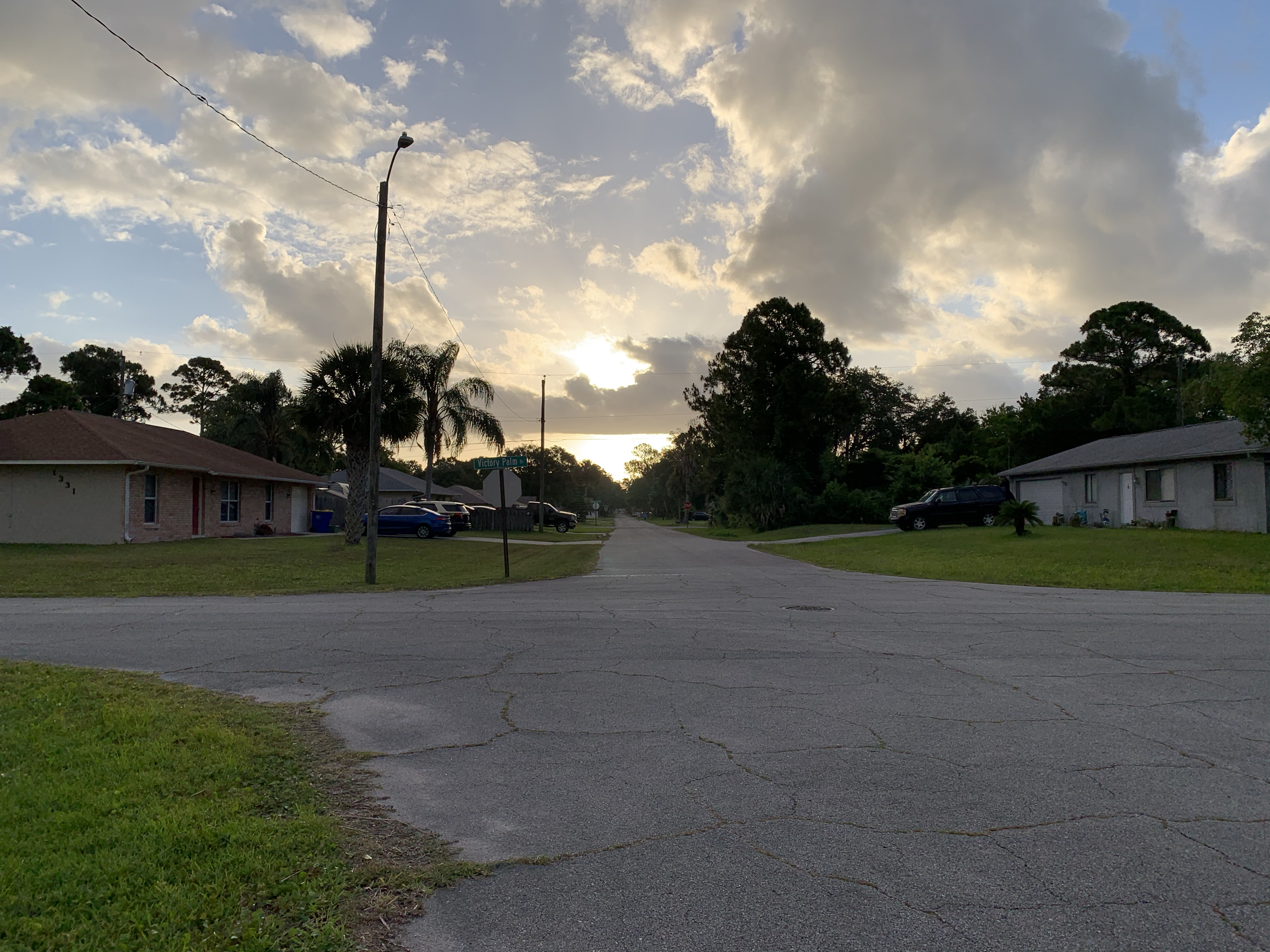 morning sun clouds Florida neighborhood