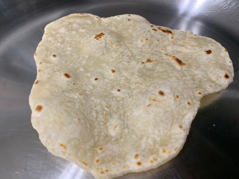 frying a homemade tortilla