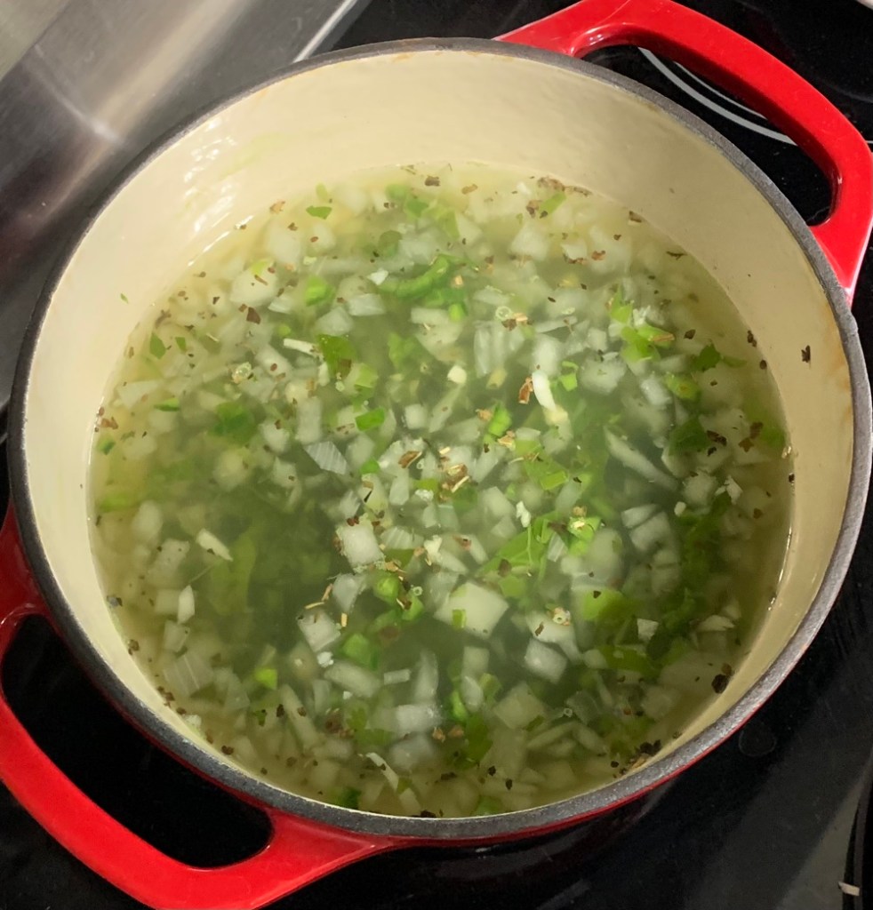 simmering chopped greens in water