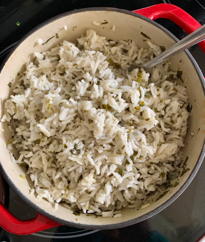 white rice cooked in water with fresh greens added