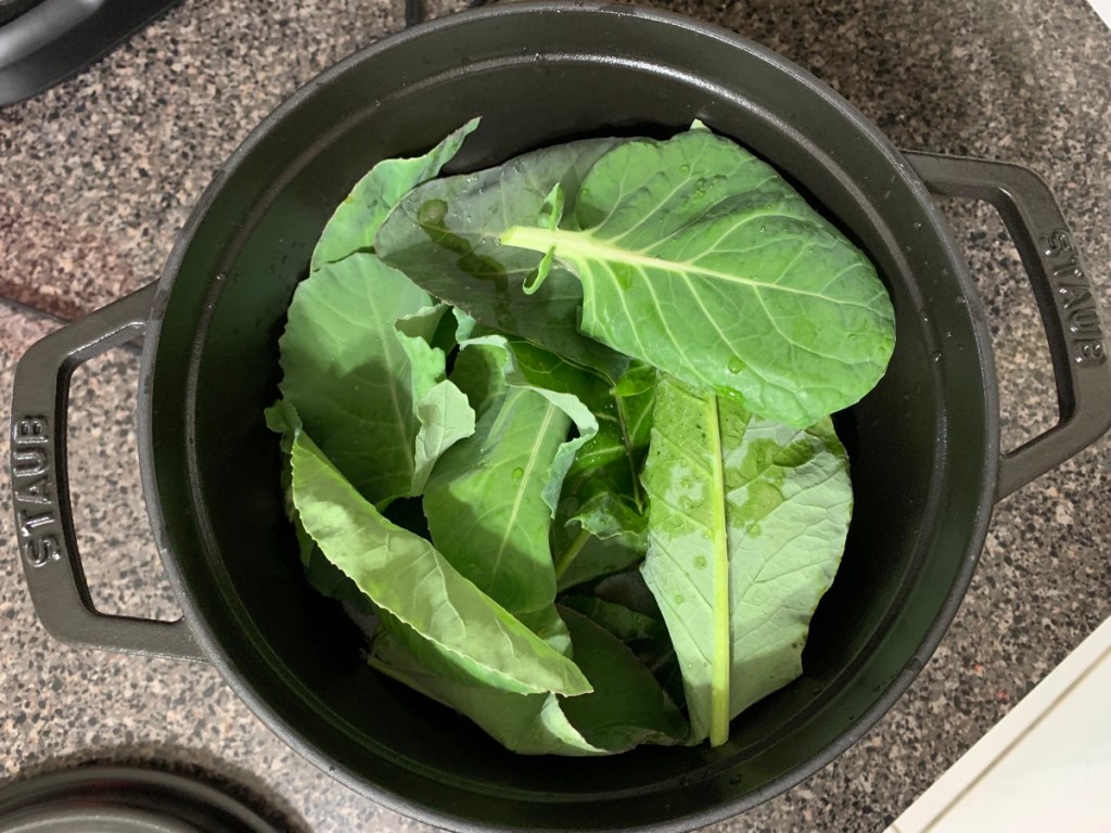 cooking leaves of broccoli, cauliflower
