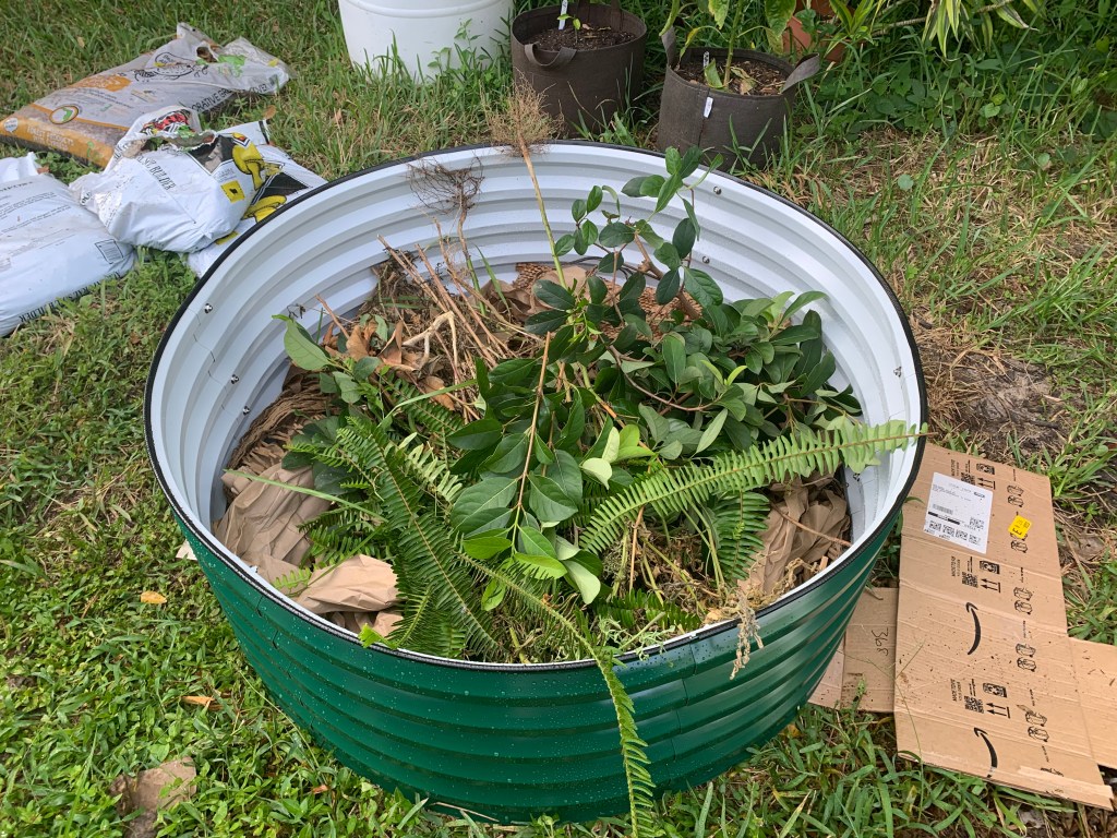 yard debris layer in raised bed