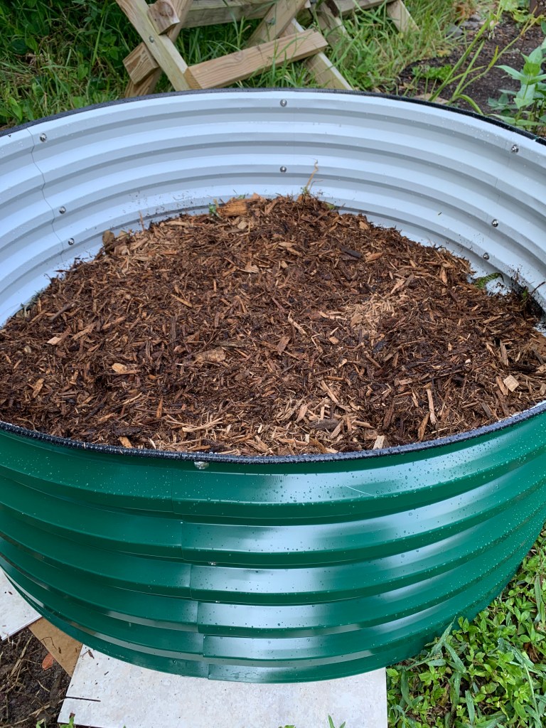 Mulch layer raised bed