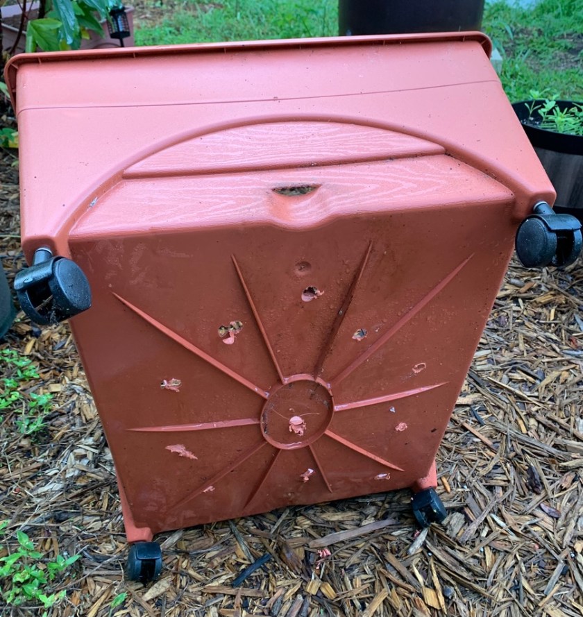 drilled holes in garden grow box