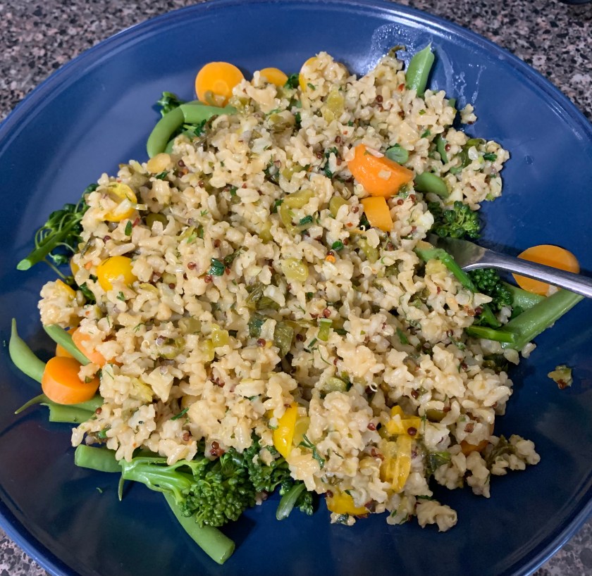 plate meal of rice and garden vegetables