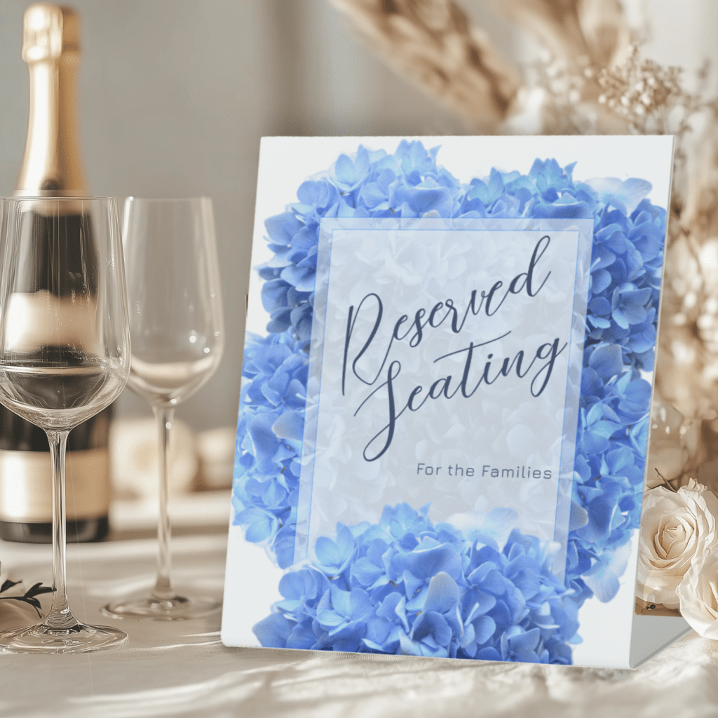 Wedding reception reserved seating sign with blue floral border  and custom text.
